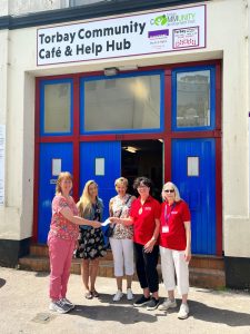 Pictured outside the Torbay Community Help Hub and Café in Temperance Street, Torquay are: (L to R)representing the Food Alliance - Sarah O’Connor and Hayley Stanley from the Ellacombe Community Partnership, and - Julie Back, Jane Watson and Elaine Biden from the Torbay Hospital Nurses League.